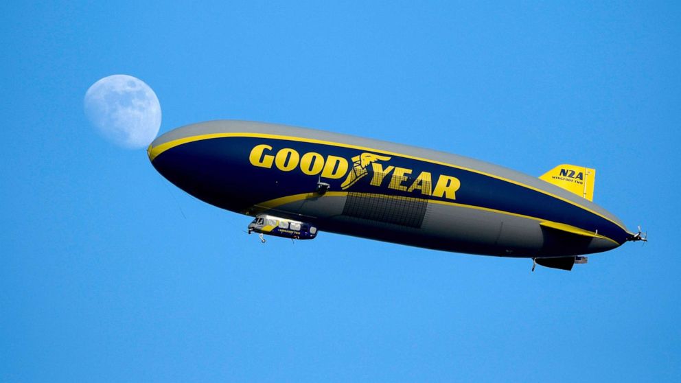 PHOTO: The Goodyear blimp circles above the ESPN Wide World of Sports Complex prior to a game between the Philadelphia Union and the Sporting Kansas City, July 30, 2020, Orlando, Fla.