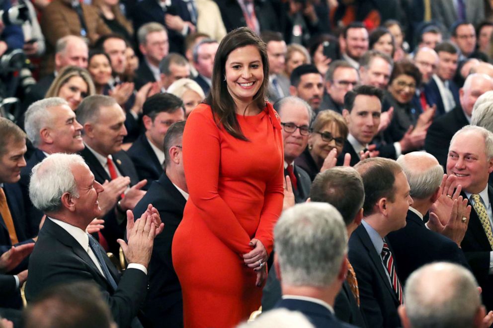 PHOTO:  Rep. Elise Stefanik stands as she's acknowledged by President Donald Trump as he speaks in the East Room of the White House Feb. 6, 2020.