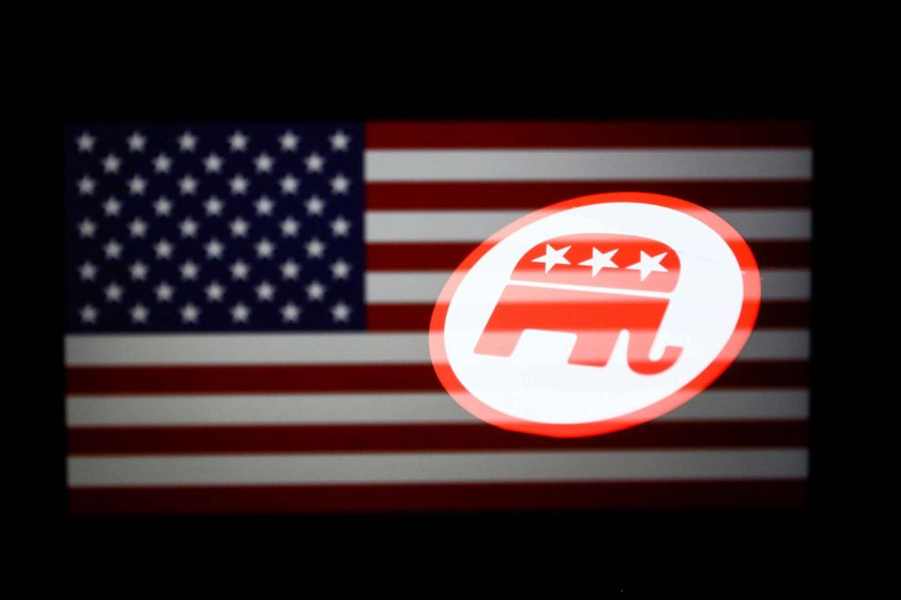 PHOTO: FILE - Republican Party logo and American flag are displayed