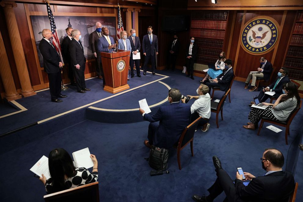 PHOTO: Sen. Tim Scott is joined by Senate Majority Leader Mitch McConnell and other Republican lawmakers for a news conference to unveil the GOP's legislation to address racial disparities in law enforcement, June 17, 2020, in Washington.
