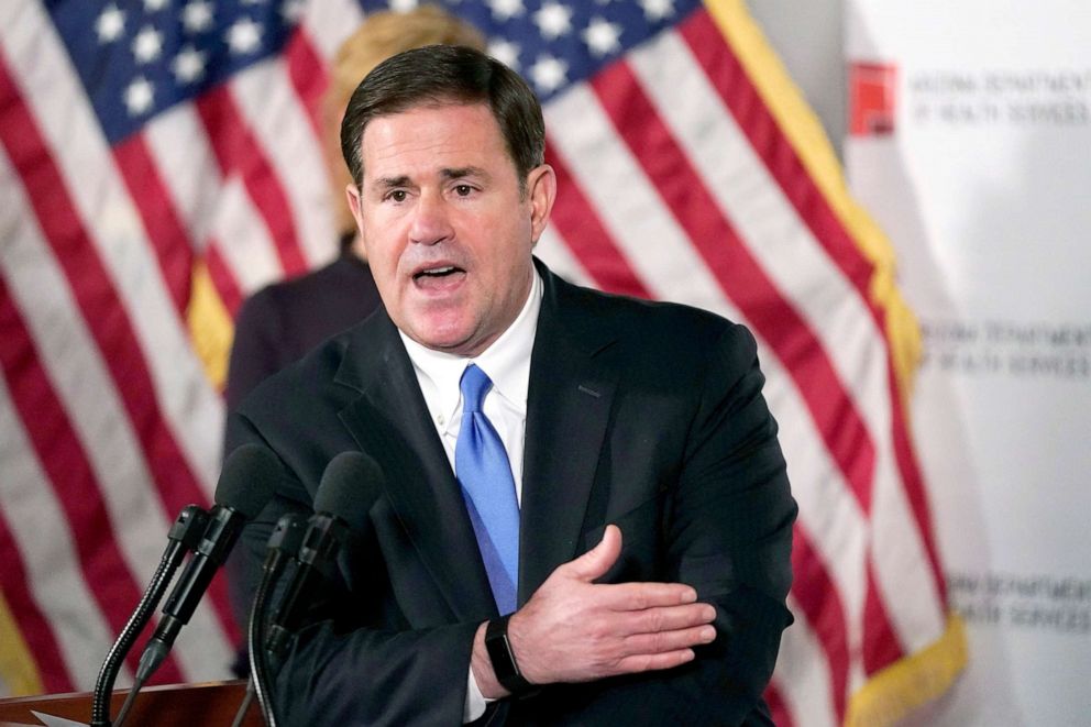 PHOTO: Arizona Republican Gov. Doug Ducey answers a question on the topic of COVID-19 in Arizona during a news conference on Dec. 2, 2020, in Phoenix.