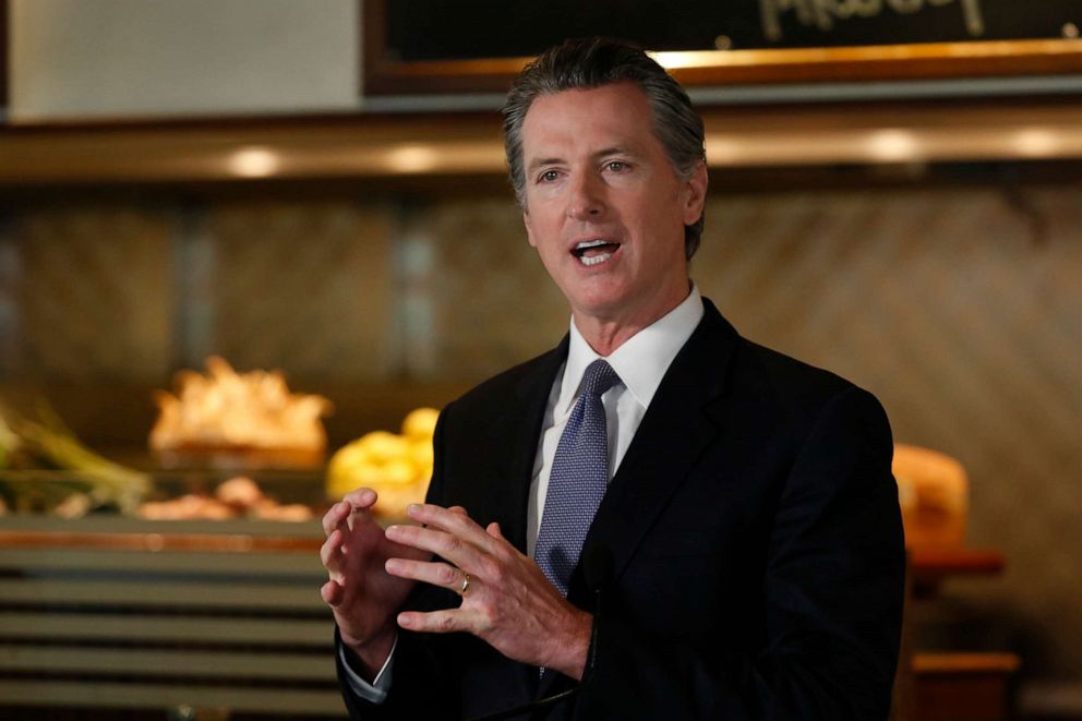 PHOTO: Gov. Gavin Newsom announces new criteria related to coronavirus hospitalizations and testing that could allow counties to open faster than the state, during a news conference at Mustards Grill in Napa, Calif., Monday May 18, 2020. 