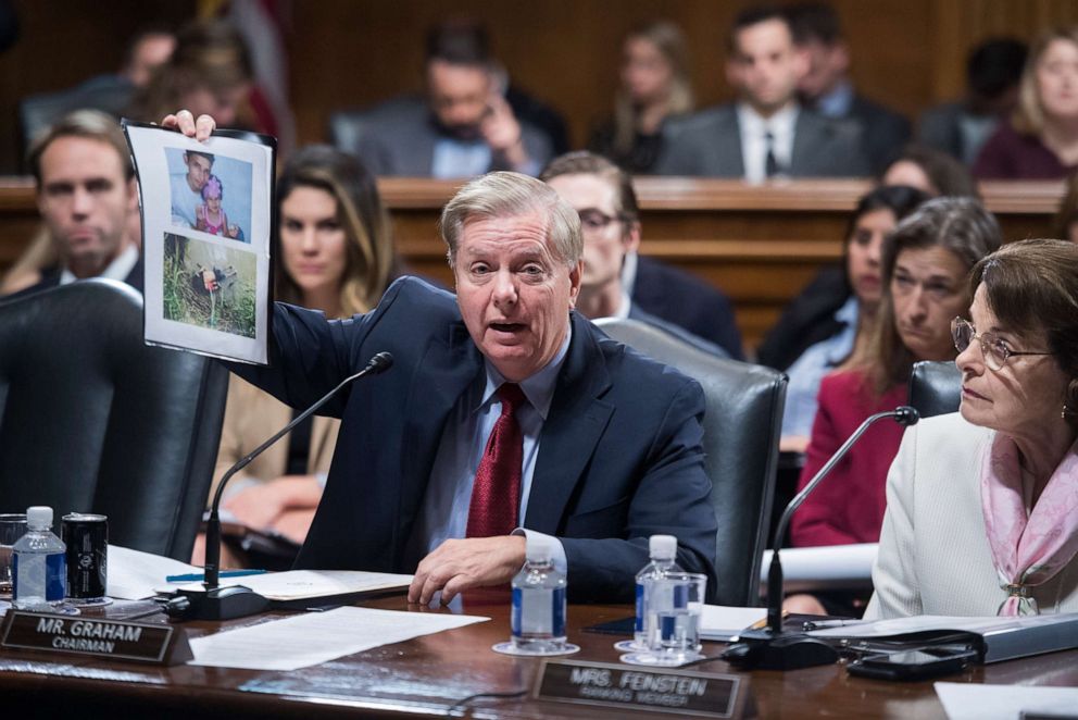 PHOTO: Chairman Lindsey Graham holds a picture of Oscar Alberto Martinez Ramirez and his daughter, Valeria during a Senate Judiciary Committee markup of the Secure and Protect Act of 2019 on August 1, 2019. 