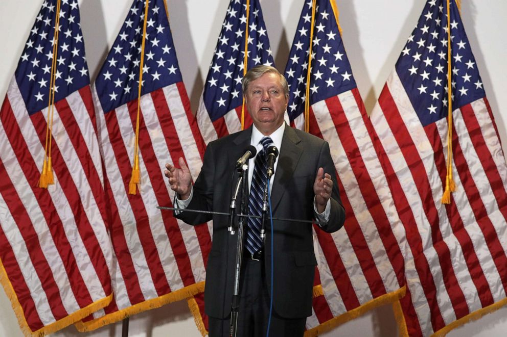 PHOTO: Sen. Lindsey Graham speaks to members of the press after the weekly Senate Republican Policy Luncheon at Hart Senate Office Building May 12, 2020 on Capitol Hill in Washington.