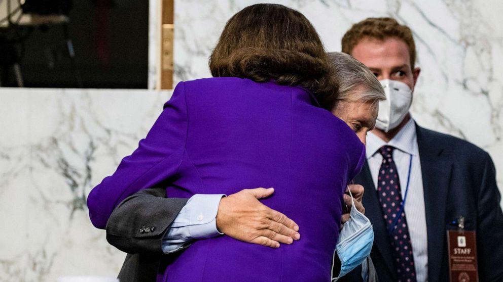 PHOTO: Ranking Member Diane Feinstein and Chairman Lindsey Graham hug as the confirmation hearings for Supreme Court nominee Judge Amy Coney Barrett come to a close on October 15, 2020 in Washington.