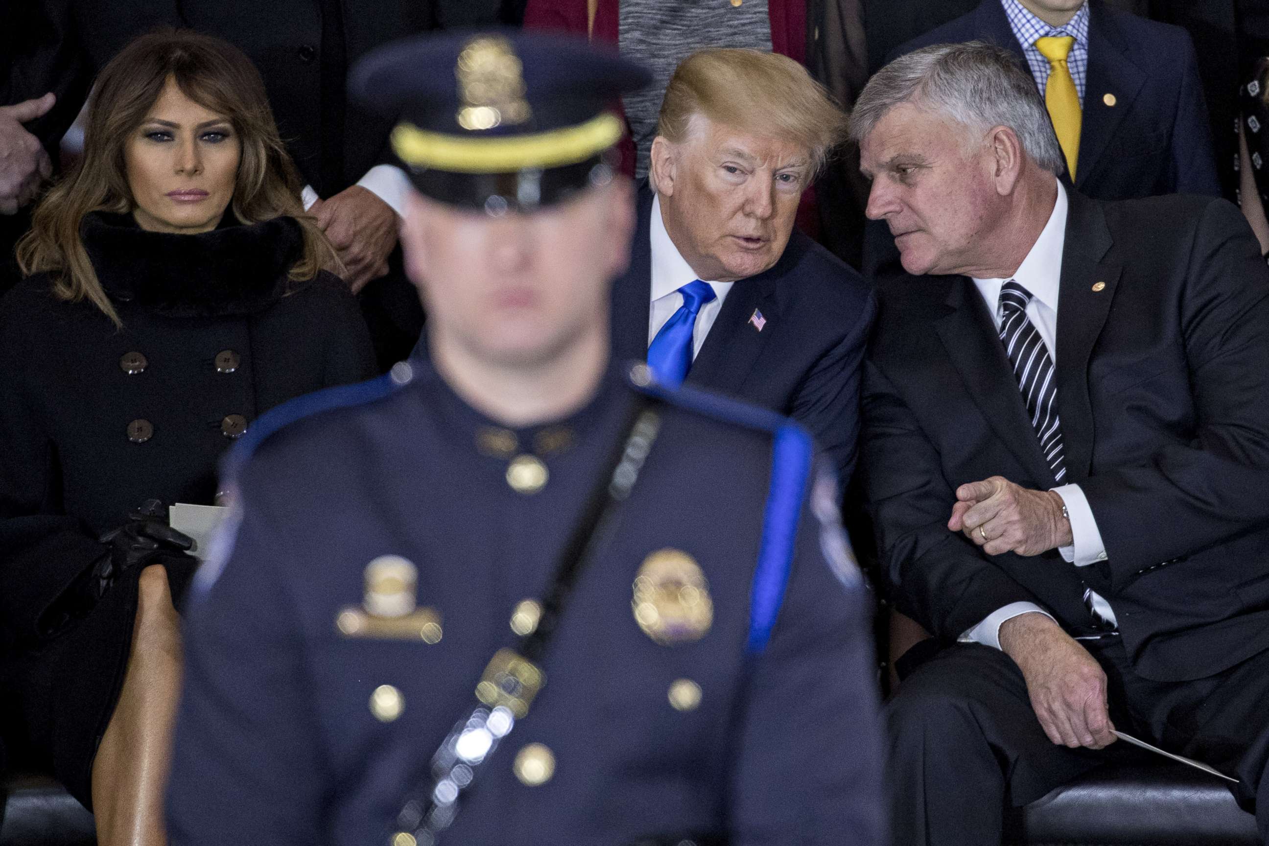 PHOTO: President Donald Trump talks to Franklin Graham, son of the late Reverend Billy Graham, during a service in Washington, D.C., Feb. 28, 2018.