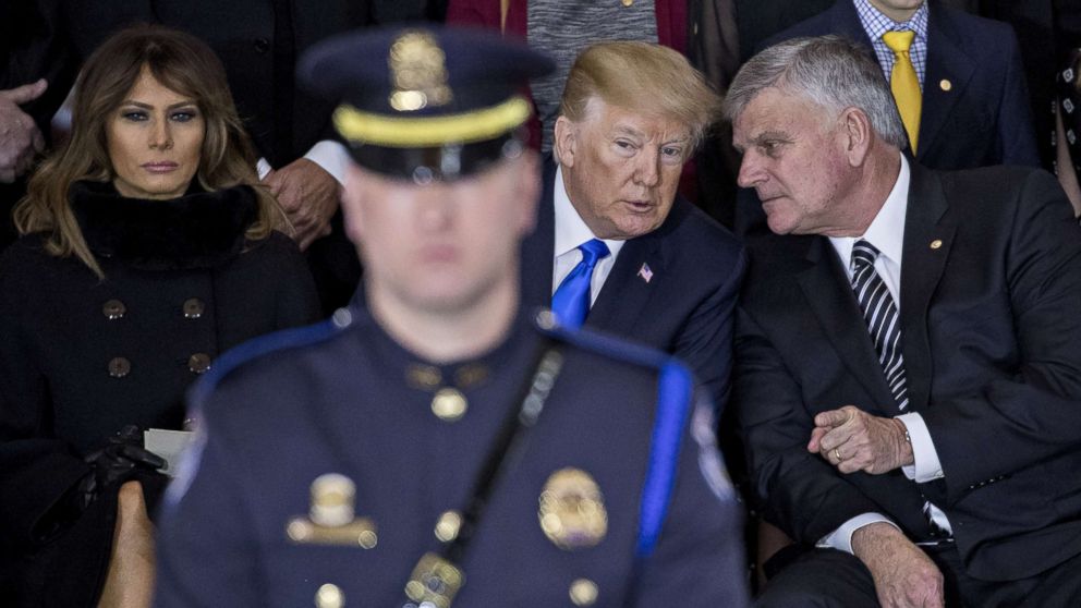 PHOTO: President Donald Trump talks to Franklin Graham, son of the late Reverend Billy Graham, during a service in Washington, D.C., Feb. 28, 2018.
