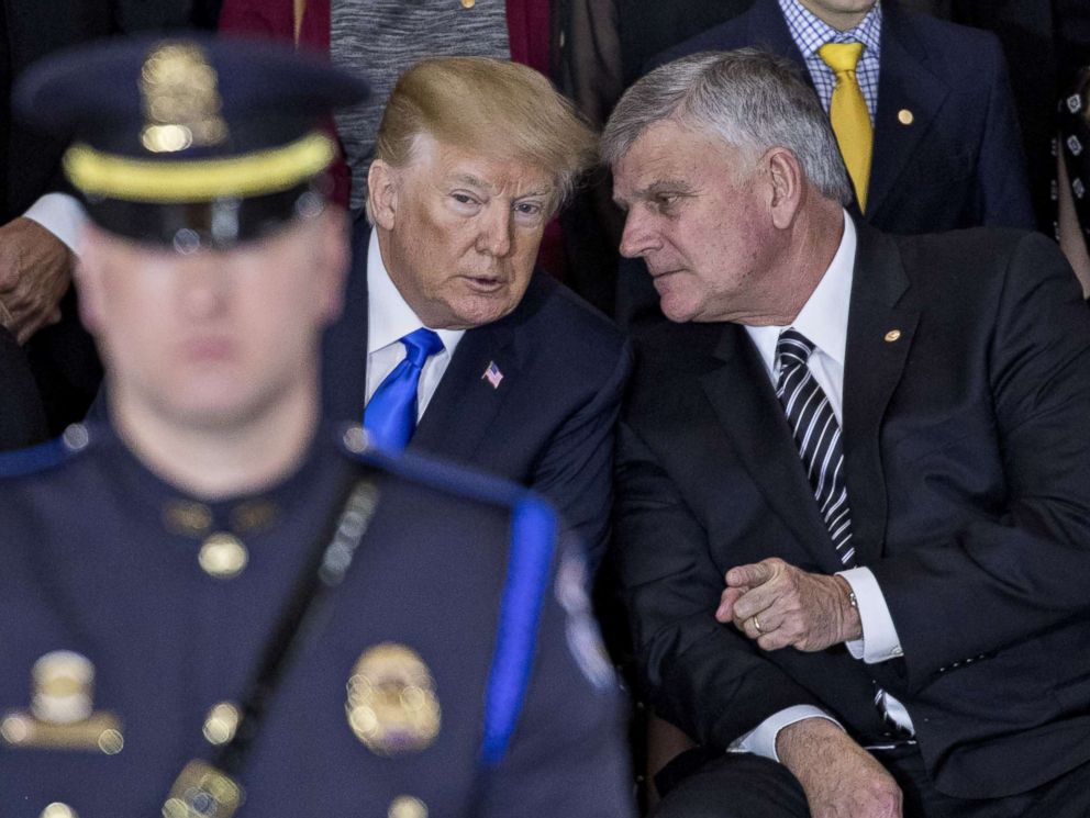 PHOTO: President Donald Trump talks to Franklin Graham, son of the late Reverend Billy Graham, during a service in Washington, D.C., Feb. 28, 2018.