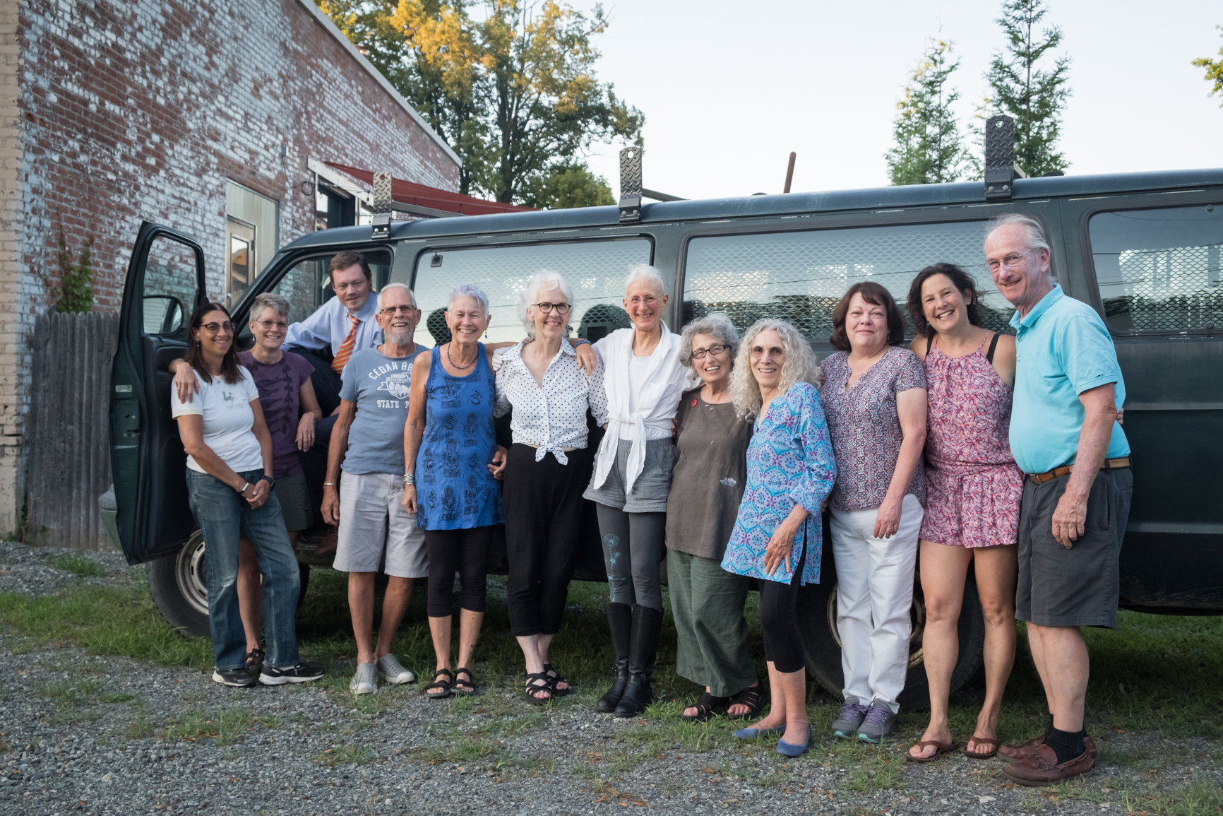 PHOTO: Grannies and supporters pose in front of the van that will be used to caravan from New York to the U.S.-Mexico border.
