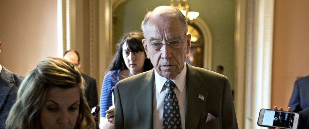 PHOTO: Senator Chuck Grassley, a Republican from Iowa, speaks to members of the media while walking to a closed-door GOP conference meeting to discuss tax reform at the U.S. Capitol, Nov. 9, 2017.