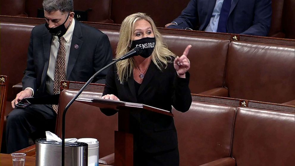 PHOTO: Rep. Marjorie Taylor Greene speaks during debate ahead of the House vote on impeachment against President Donald Trump, while wearing a mask that reads, "censored," in the House Chamber of the U.S. Capitol in Washington, D.C., Jan. 13, 2021.