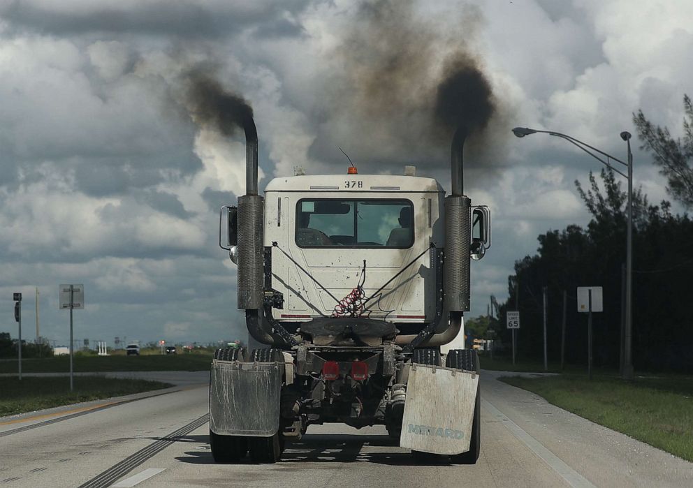 PHOTO: Smoke pours from the exhaust pipes on a truck in Miami, Nov. 05, 2019.