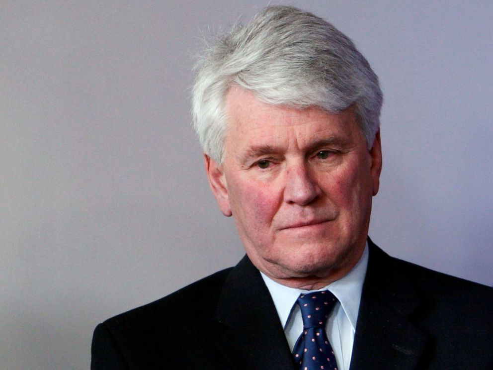 PHOTO: Greg Craig listens as President Barack Obama makes a surprise appearance during the daily press briefing at the White House in Washington, May 1, 2009.