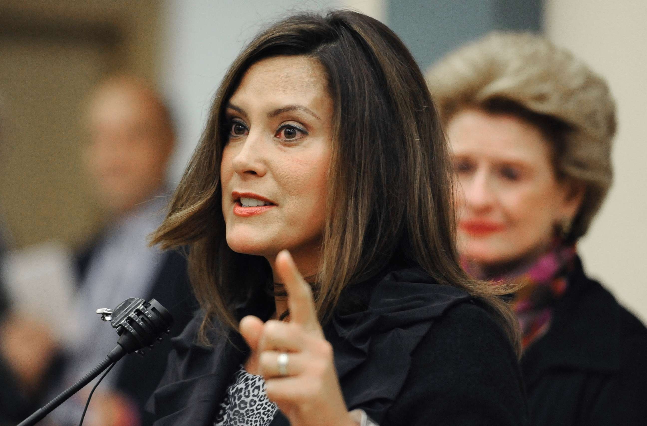 PHOTO: Michigan Senate Democratic Leader Gretchen Whitmer, foreground, addresses the media following a town hall meeting in Detroit, Oct. 12, 2014.
