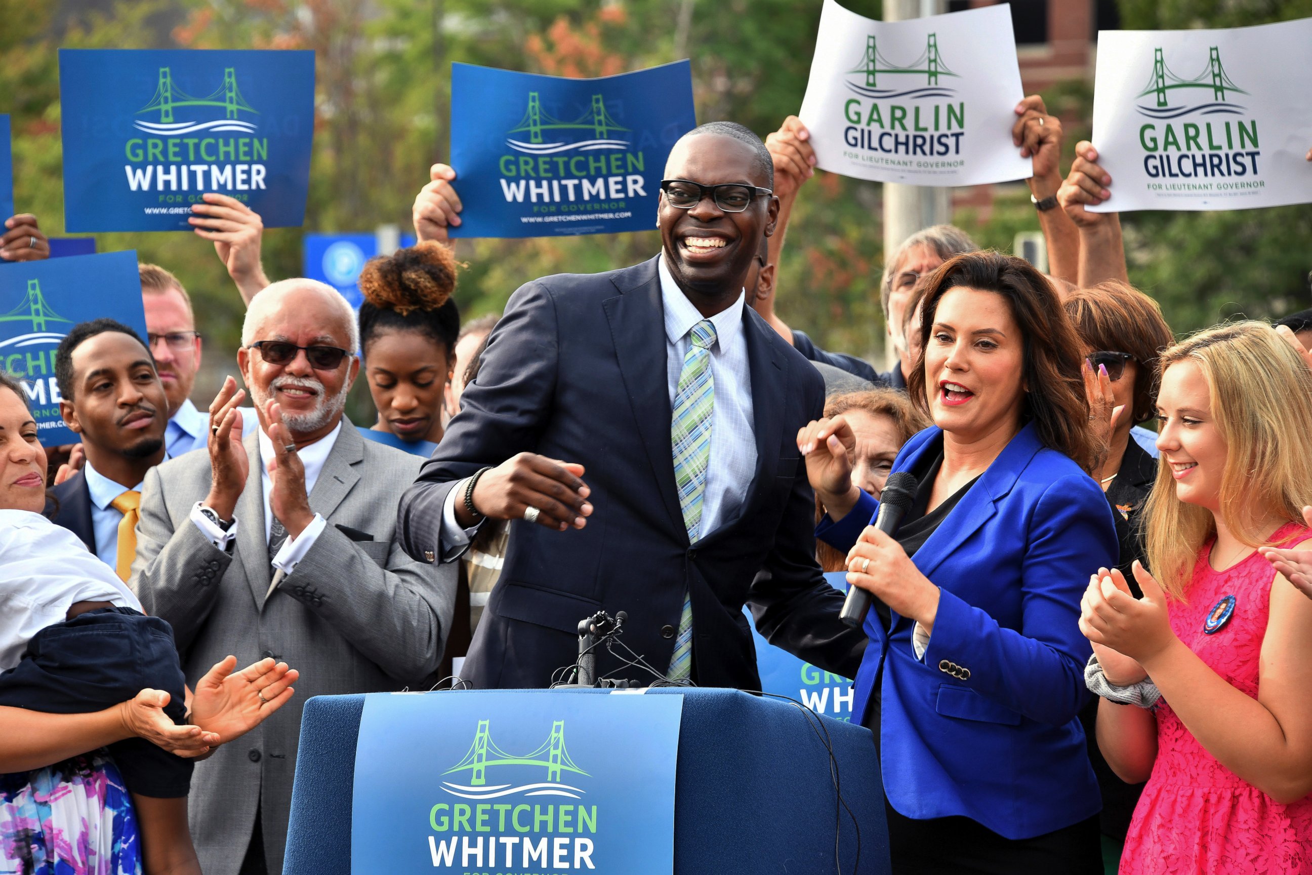 PHOTO: Democratic candidate for governor, Gretchen Whitmer, right, announces that her running mate is Garlin Gilchrist II, center, during an event in downtown Lansing, Mich., on Monday, Aug 20, 2018. 