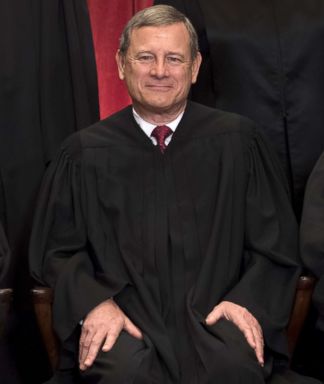 PHOTO: Chief Justice John Roberts sits for an official photo with other members of the Supreme Court in the Supreme Court in Washington, DC, June 1, 2017.