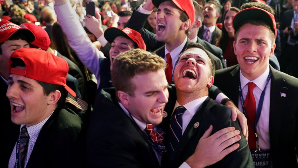 PHOTO: People cheer as voting results for Iowa come in at Donald Trump's election night event at the New York Hilton Midtown on Nov. 8, 2016 in New York City.