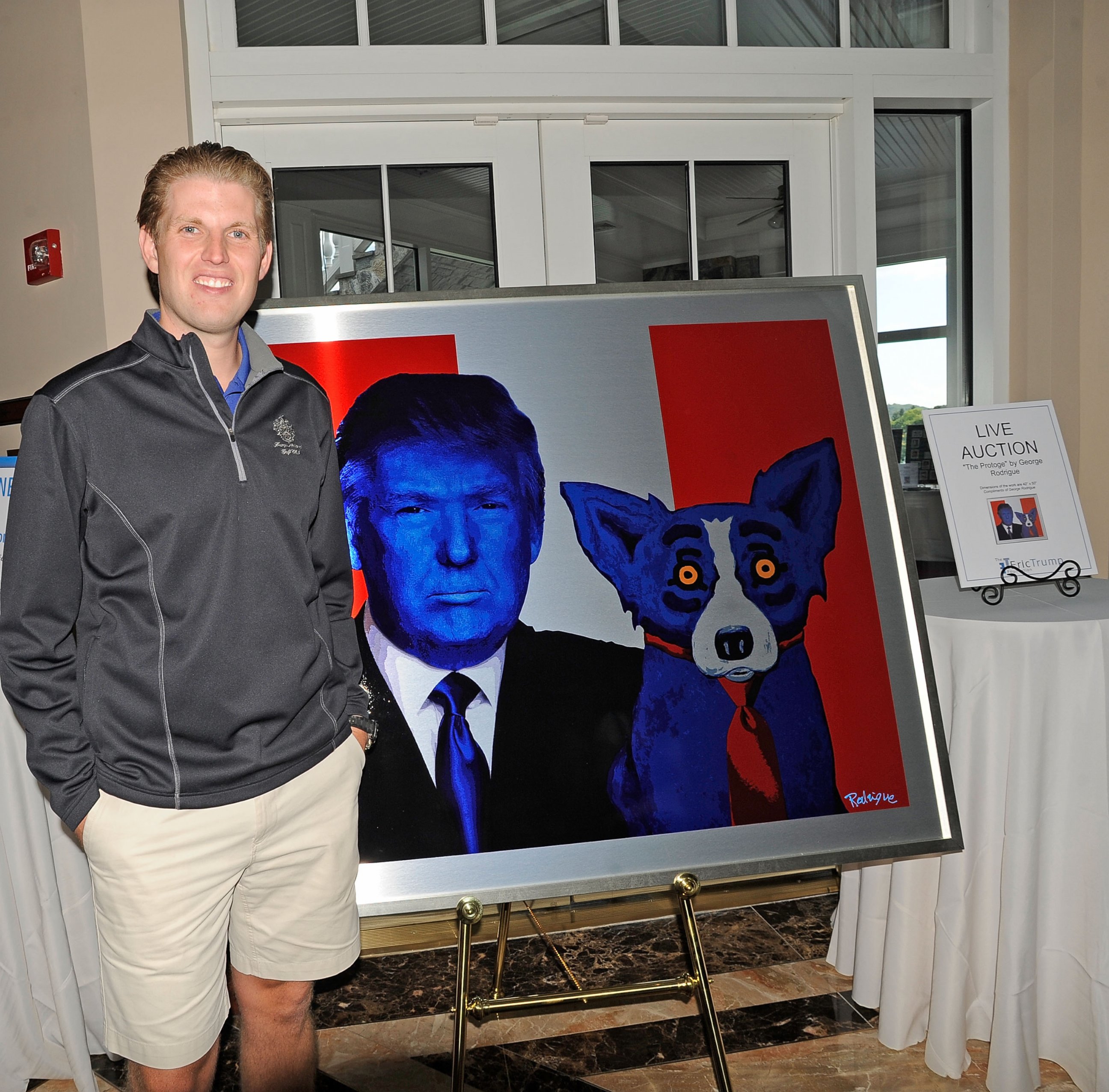 PHOTO: Eric Trump stands next to a painting at his foundation's 6th annual golf invitational benefiting The St. Jude Children's Research Hospital at Trump National Golf Club Westchester on Sept. 10, 2012 in Briarcliff Manor, N.Y.