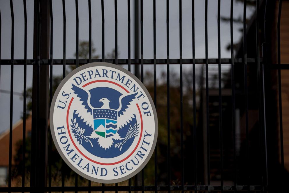 PHOTO: The Department of Homeland Security seal hangs on a fence at the agency's headquarters in Washington, Dec. 11, 2014.