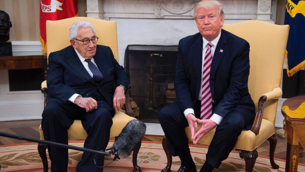 PHOTO: US President Donald Trump speaks with former Secretary of State Henry Kissinger during a meeting in the Oval Office of the White House in Washington, May 10, 2017.