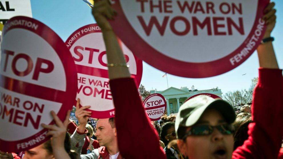 Activists protest the Trump administration and rally for women's rights during a march to honor International Woman's Day, March 8, 2017, in Washington, D.C. 