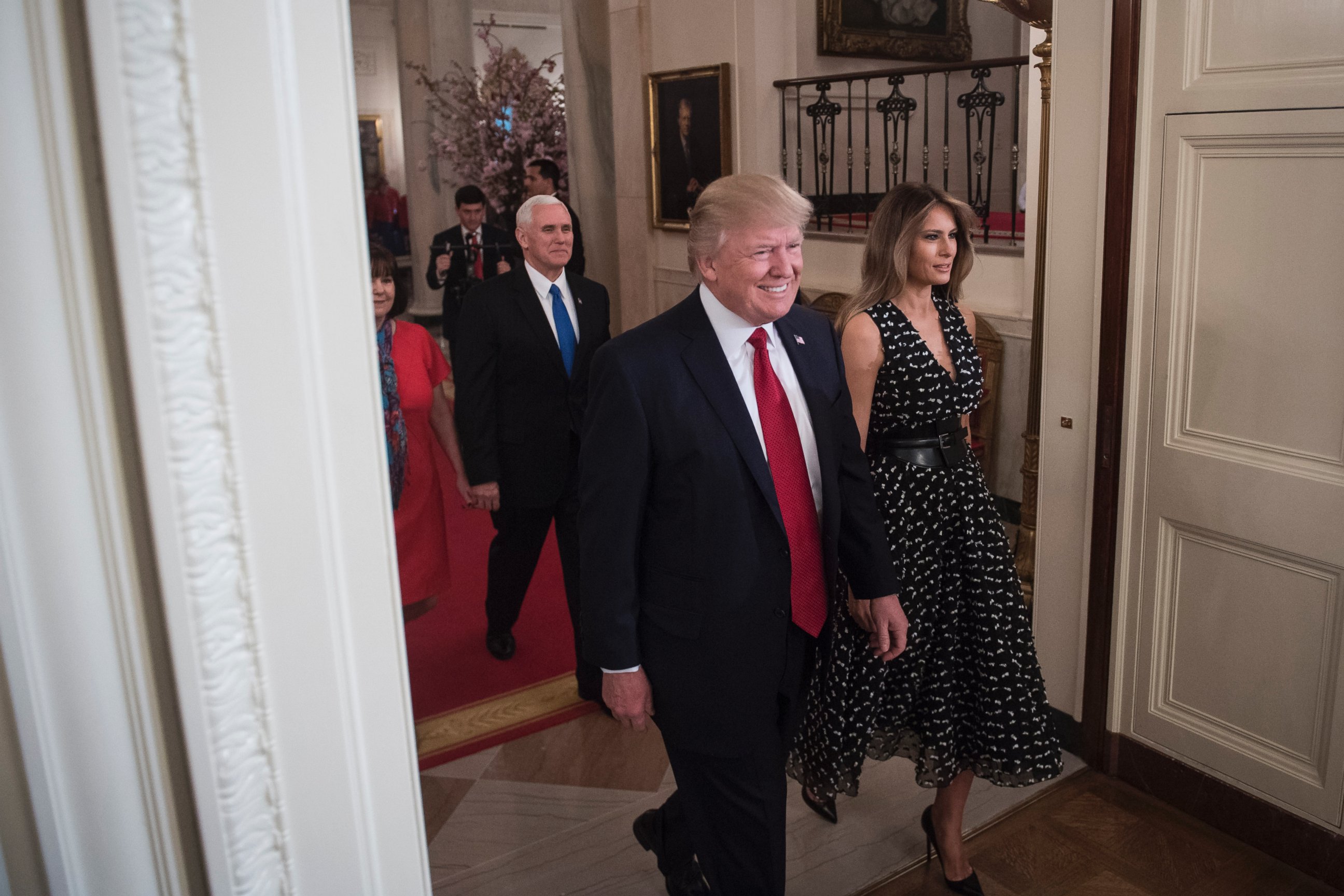 PHOTO: President Donald Trump and first lady Melania Trump followed by Vice President Mike Pence and his wife Karen arrive for a Wounded Warrior Project Soldier Ride event in the East Room of the White House, April 6, 2017. 