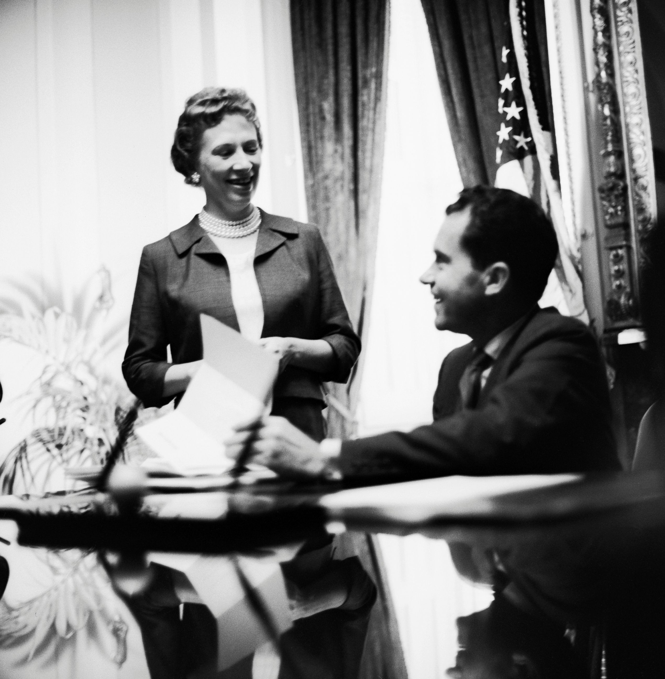 PHOTO: Rosemary Woods Talking to Richard Nixon in the Oval Office of the White House. 