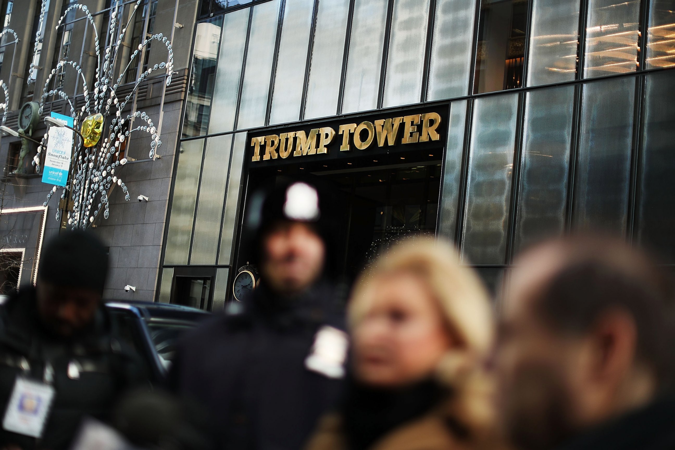 PHOTO: People stand outside of Trump Tower during a press conference on Dec. 9, 2016 in New York.