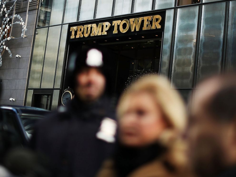 PHOTO: People stand outside of Trump Tower during a press conference on Dec. 9, 2016 in New York.