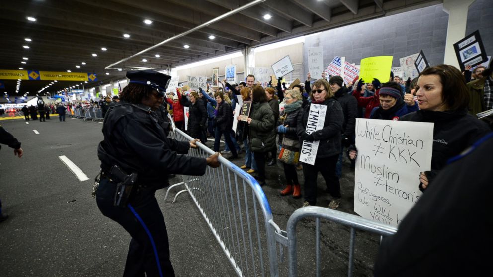 PHOTO: Police create more space as hundreds of protesters fill the Philadelphia International Airport on Jan. 29th, 2017 in Philadelphia Pennsylvania. 