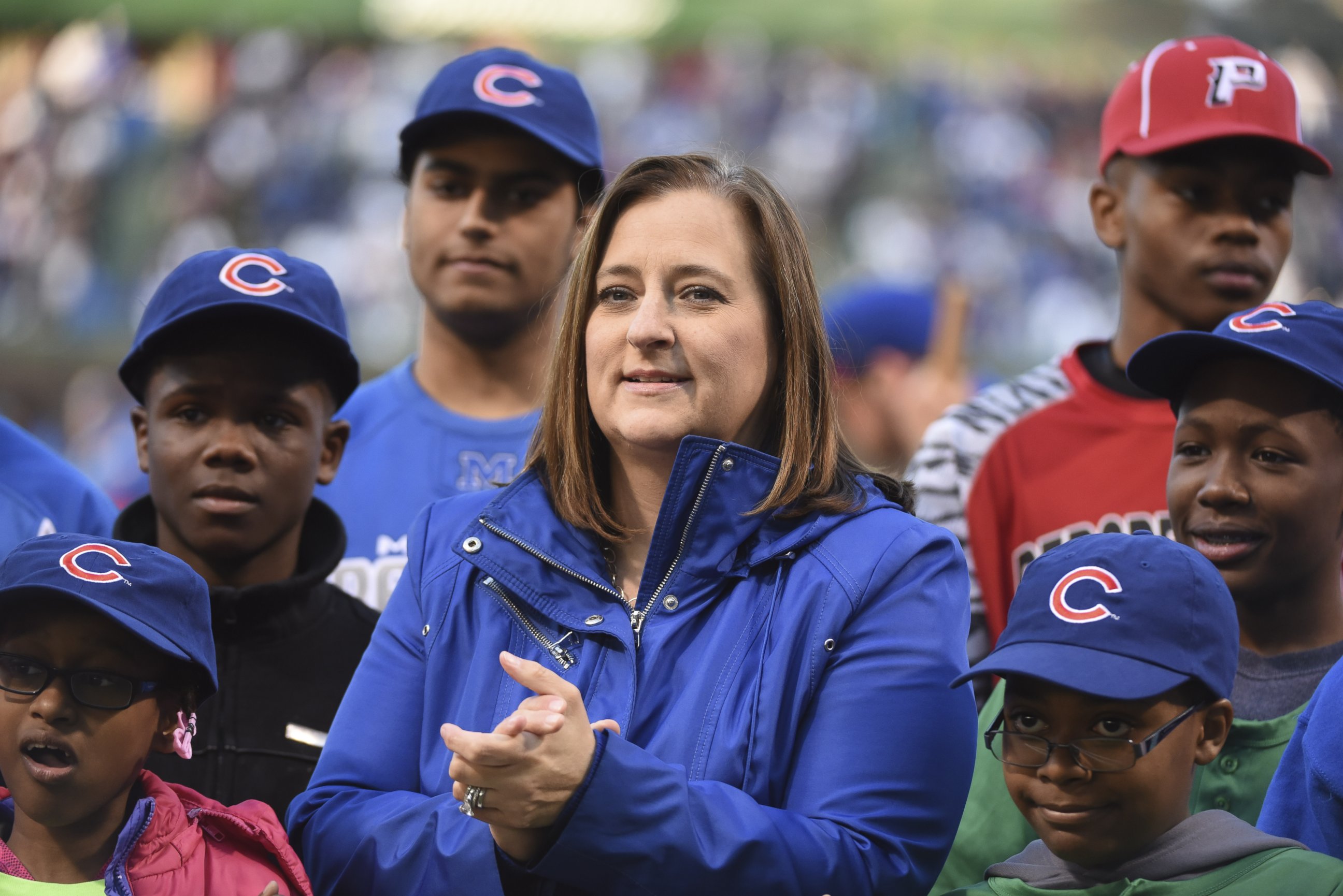 PHOTO: Laura M. Ricketts (C) co-owner of the Chicago Cubs  before the game between the Chicago Cubs and the Cincinnati Reds, April 14, 2016, at Wrigley Field in Chicago.