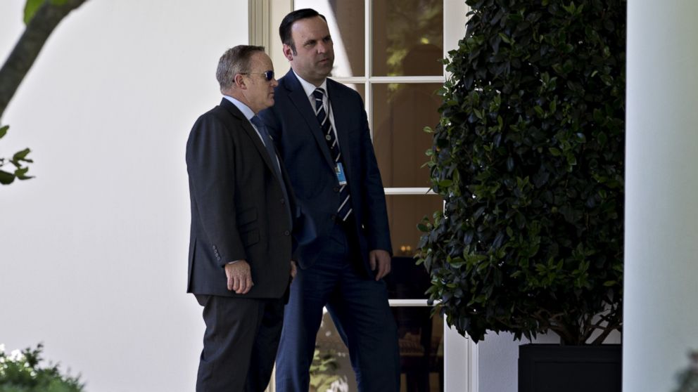 Dan Scavino Jr., White House Director of Social Media, right, speaks with Sean Spicer, White House Press Secretary, outside the Oval Office of the White House in Washington, D.C., May 17, 2017.