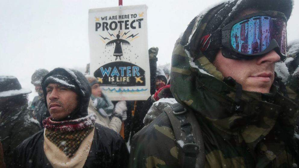 PHOTO: Despite blizzard conditions, military veterans march in support of the "water protectors" at Oceti Sakowin Camp on the edge of the Standing Rock Sioux Reservation, Dec. 5, 2016 outside Cannon Ball, North Dakota. 