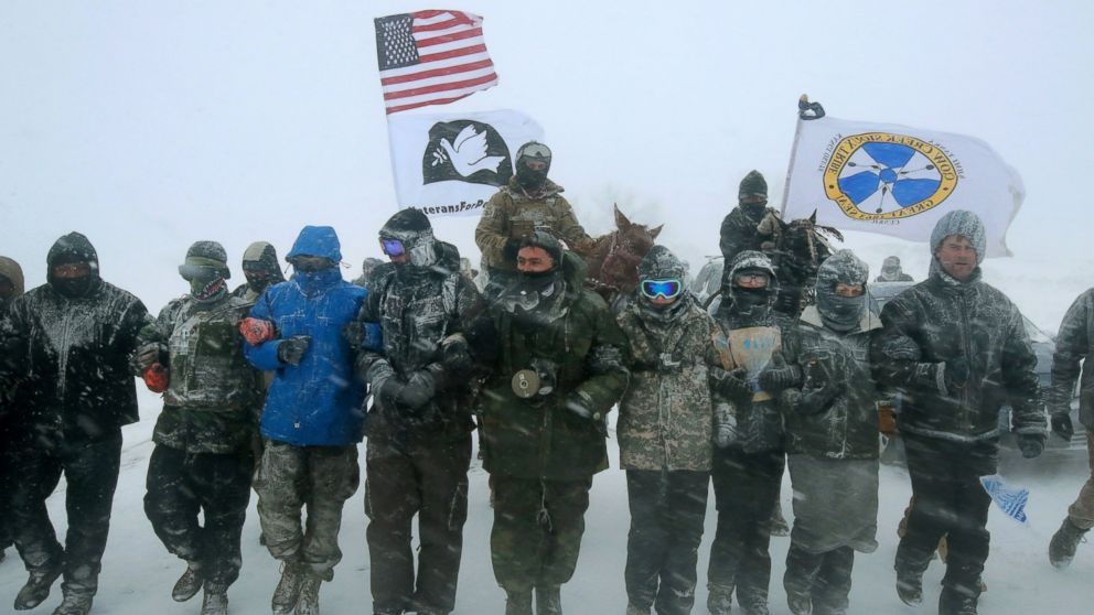 PHOTO: Despite blizzard conditions, military veterans march in support of the "water protectors" at Oceti Sakowin Camp on the edge of the Standing Rock Sioux Reservation, Dec. 5, 2016, outside Cannon Ball, North Dakota. 