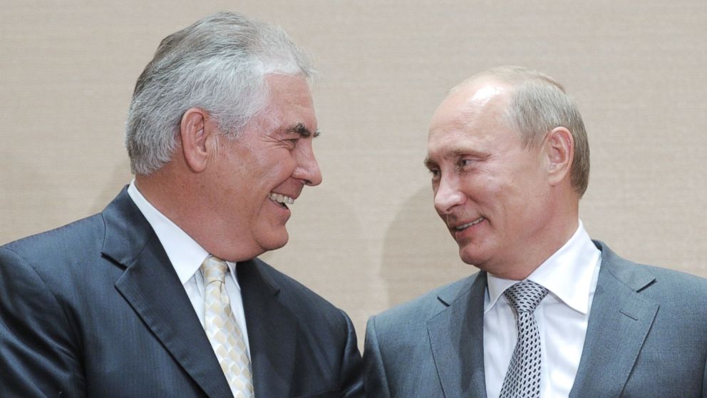 A file photo shows Russia's Vladimir Putin speaking with ExxonMobil President and Chief Executive Officer Rex Tillerson in Sochi on Aug. 30, 2011.