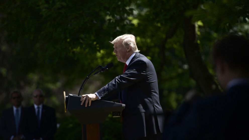 President Donald Trump announces his decision to withdraw the U.S. from the Paris Climate Accords in the Rose Garden of the White House, June 1, 2017. 