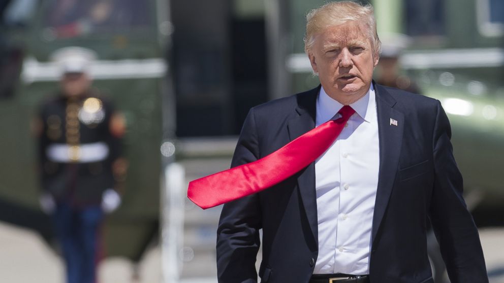 President Donald Trump walks to board Air Force One prior to departing from Andrews Air Force Base in Maryland, April 18, 2017, as he travels to Wisconsin.