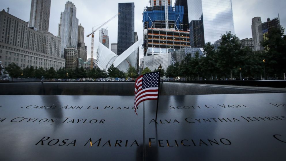 A U.S. flag is placed on the 9/11 memorial before the ceremony to commemorate the 14th Anniversary of the terrorist attacks on Sept. 11, 2015 in New York.   