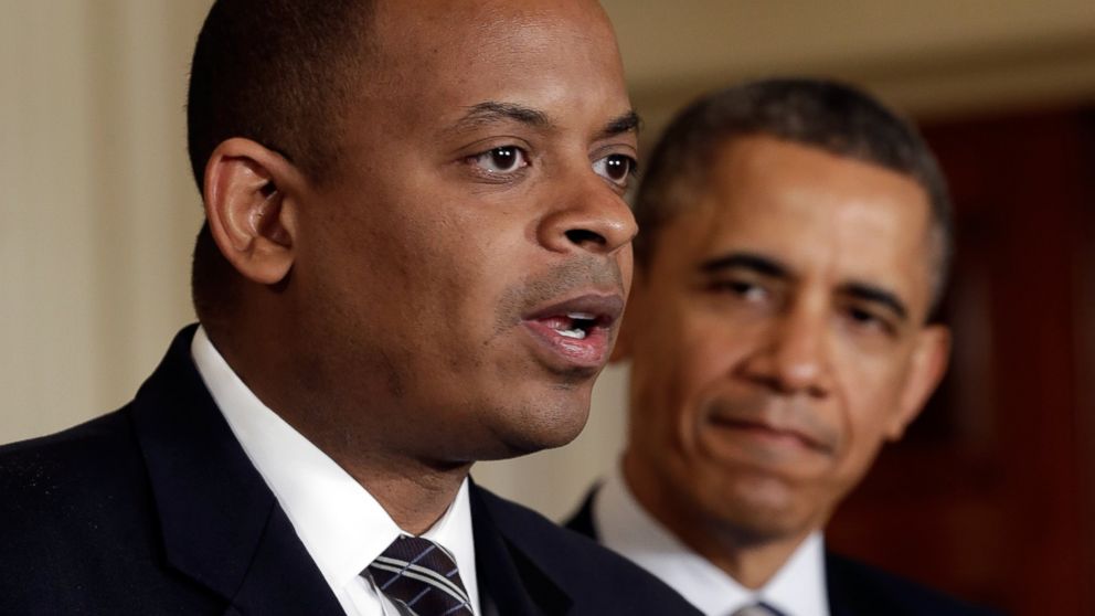 President Barack Obama listens as then Charlotte Mayor Anthony Foxx speaks after announcing him as his nominee for Secretary of Transportation at the White House April 29, 2013 in Washington, DC.