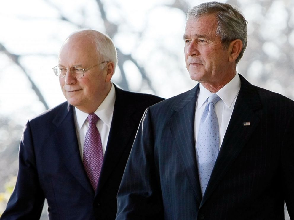 PHOTO: George W. Bush and Dick Cheney talk as they make their way to the Rose Garden at the White House Dec. 14, 2007 in Washington