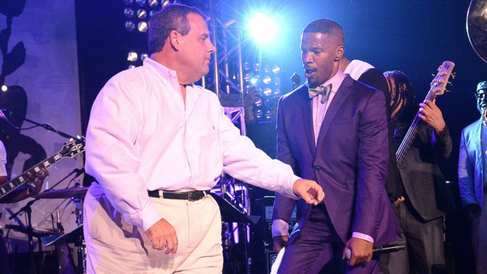 PHOTO: New Jersey Governor Chris Christie dances onstage with Jamie Foxx on Aug. 16, 2014, in East Hampton, N.Y.