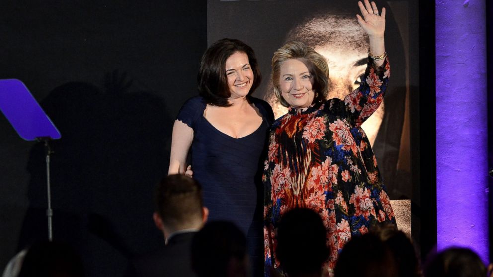PHOTO: Sheryl Sandberg and Hillary Clinton are seen in this file photo onstage at the Women for Women 20th Anniversary Gala celebration, Dec. 3, 2013, in New York.