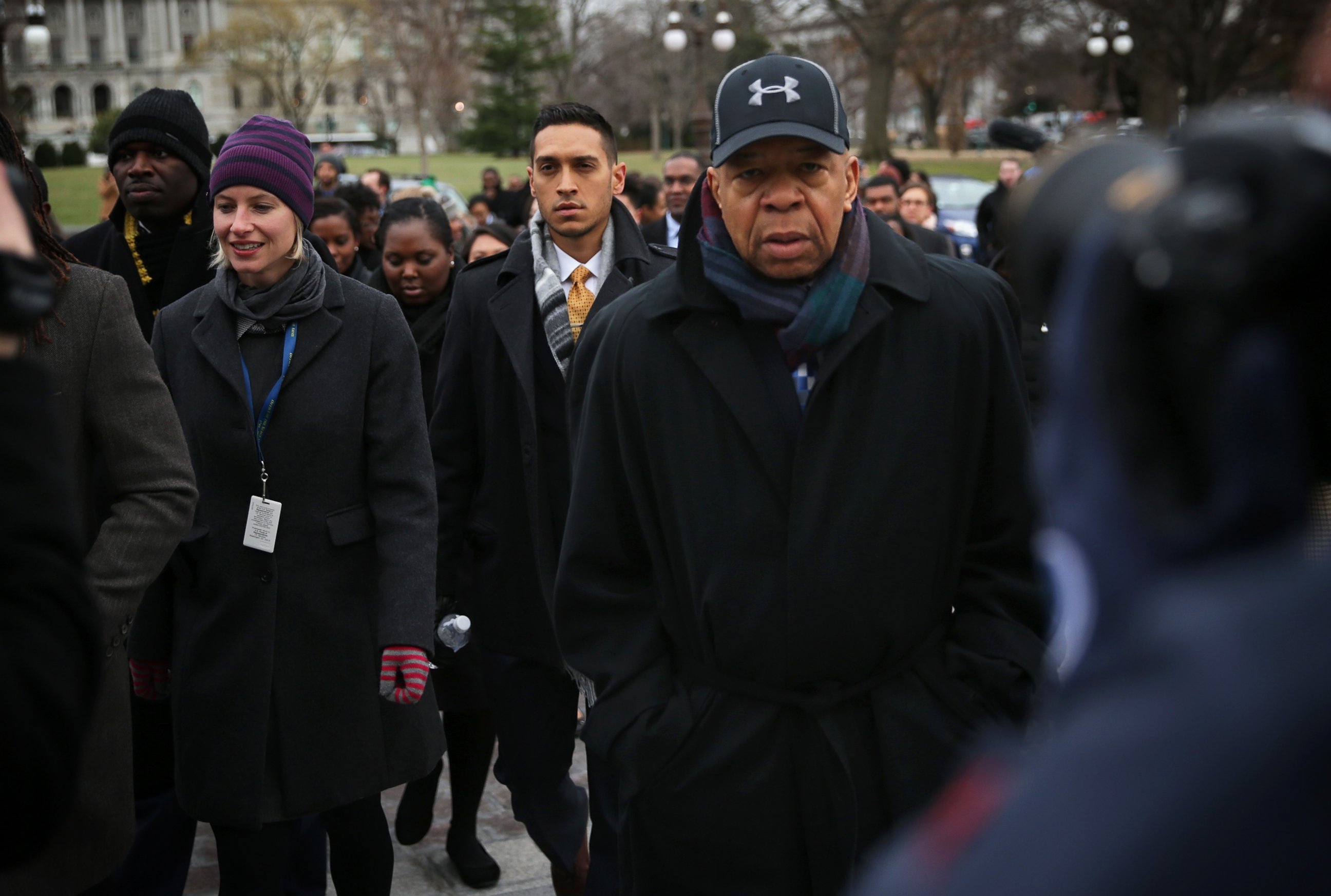 PHOTO: Rep. Elijah Cummings joins black congressional staffers during a walkout on the steps of the U.S. Capitol in Washington, DC on Dec. 11, 2014.