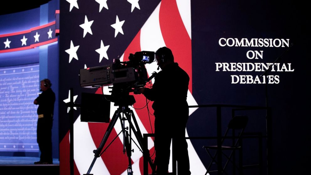 Television news crews prepare for the first presidential debate featuring Democratic presidential candidate Hillary Clinton and Republican presidential candidate Donald Trump at Hofstra University, Sept. 25, 2016, in Hempstead, New York.