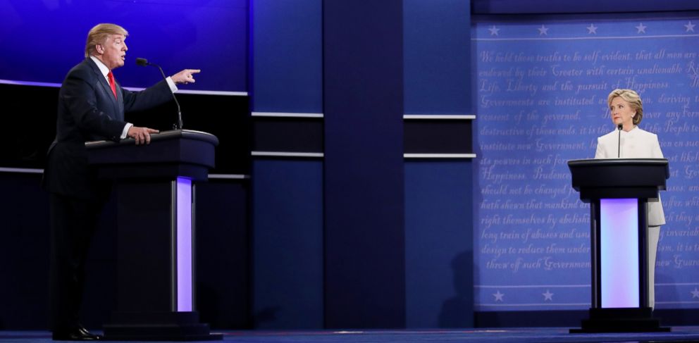 PHOTO: Republican presidential nominee Donald Trump speaks as Democratic presidential nominee Hillary Clinton looks on during the third U.S. presidential debate at the Thomas & Mack Center in Las Vegas, Oct. 19, 2016.