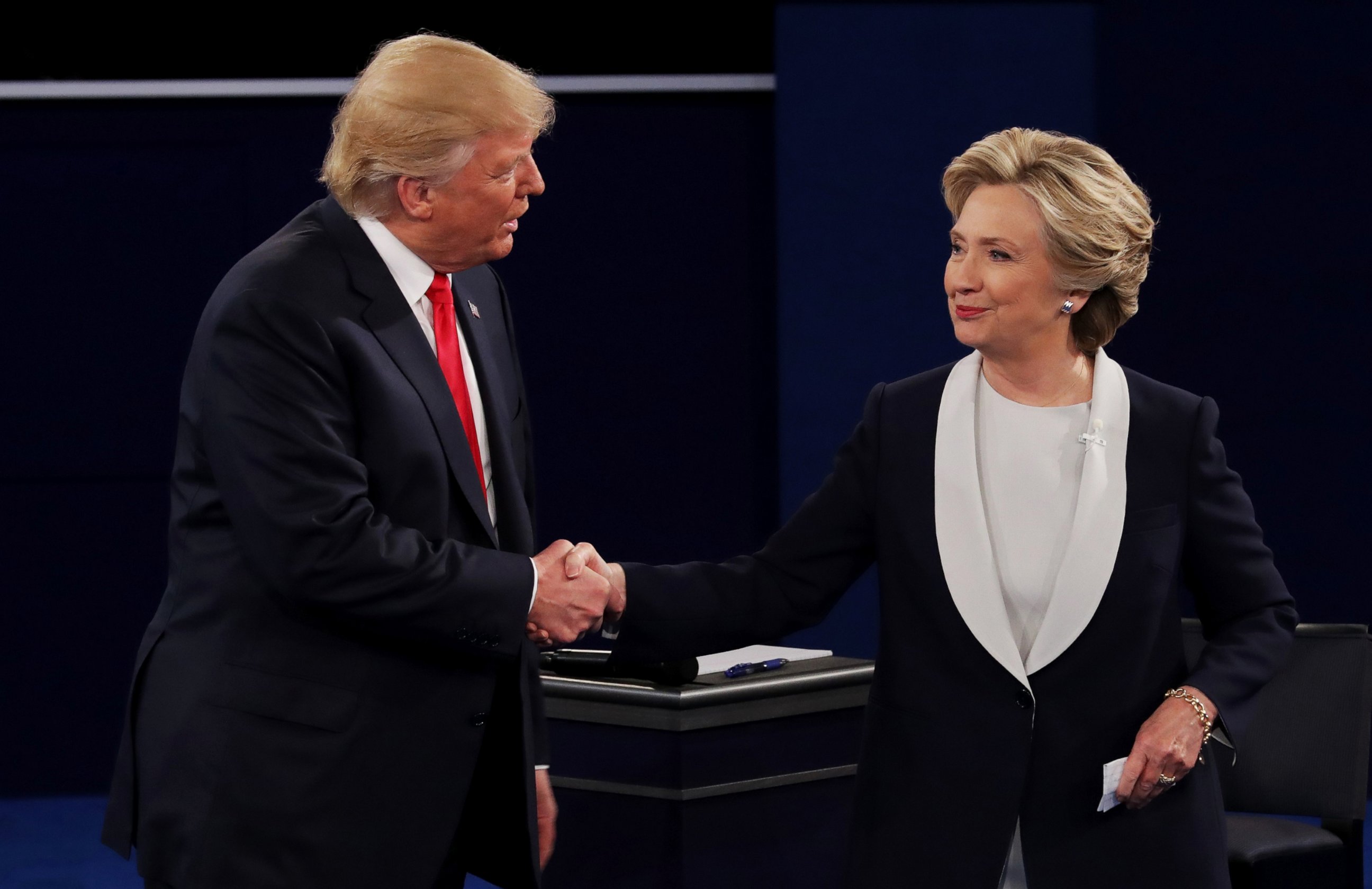 PHOTO: Donald Trump shakes hands with Hillary Clinton during the town hall debate at Washington University on Oct. 9, 2016 in St Louis, Missouri. 