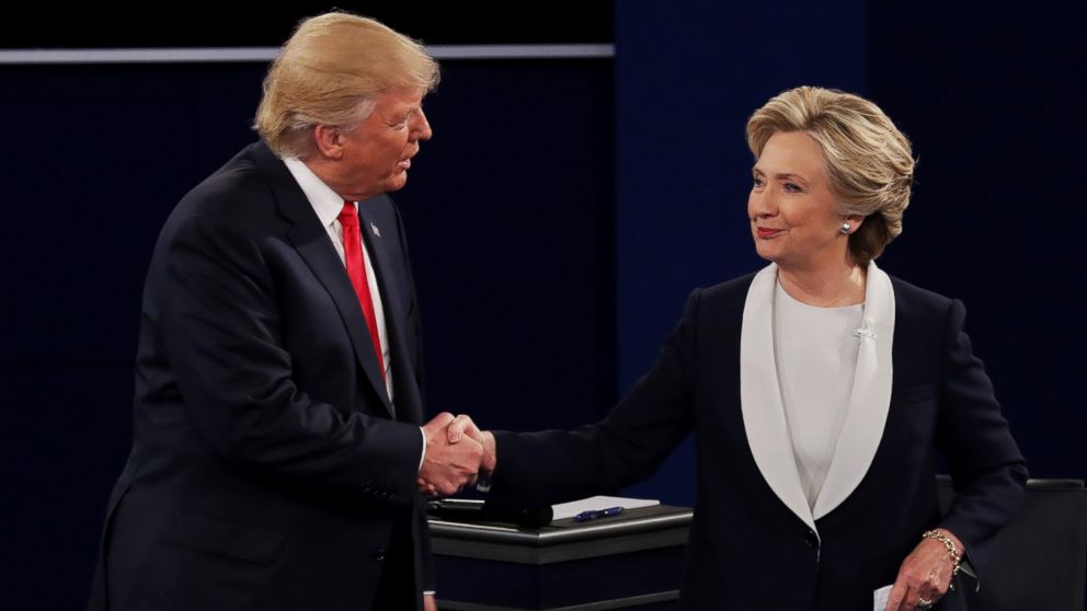 PHOTO: Donald Trump shakes hands with Hillary Clinton during the town hall debate at Washington University on Oct. 9, 2016 in St Louis, Missouri.