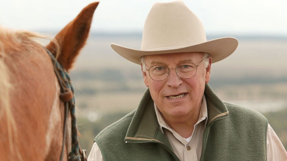 Then-Vice President Dick Cheney stands with his horse on Aug. 18, 2004 near Moose, Wyo.