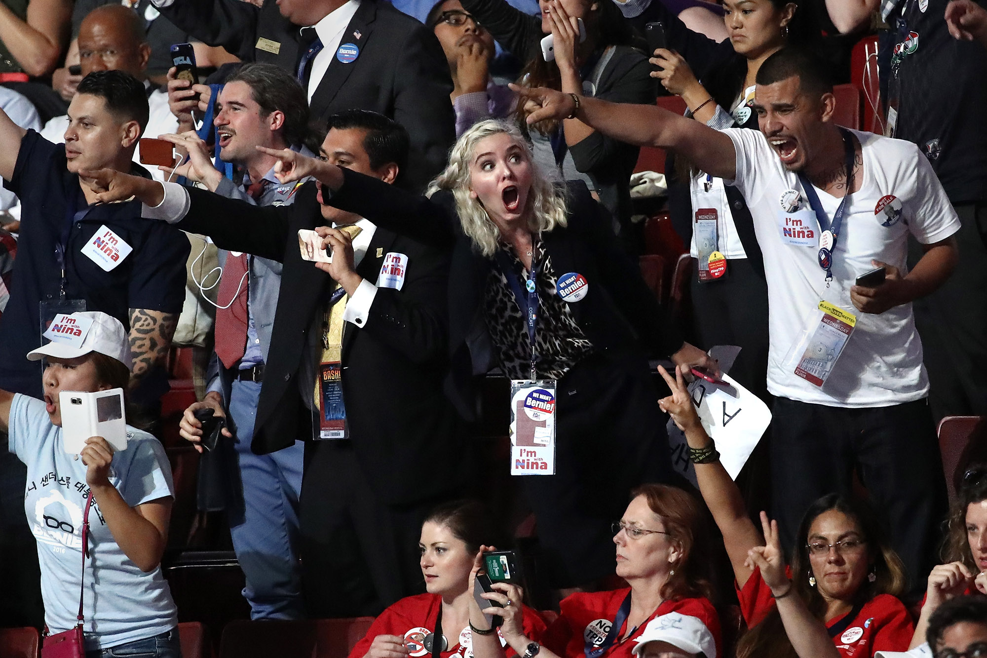 PHOTO: Attendees chant during former Secretary of Defense Leon Panetta's speech on the third day of the Democratic National Convention, July 27, 2016, in Philadelphia.