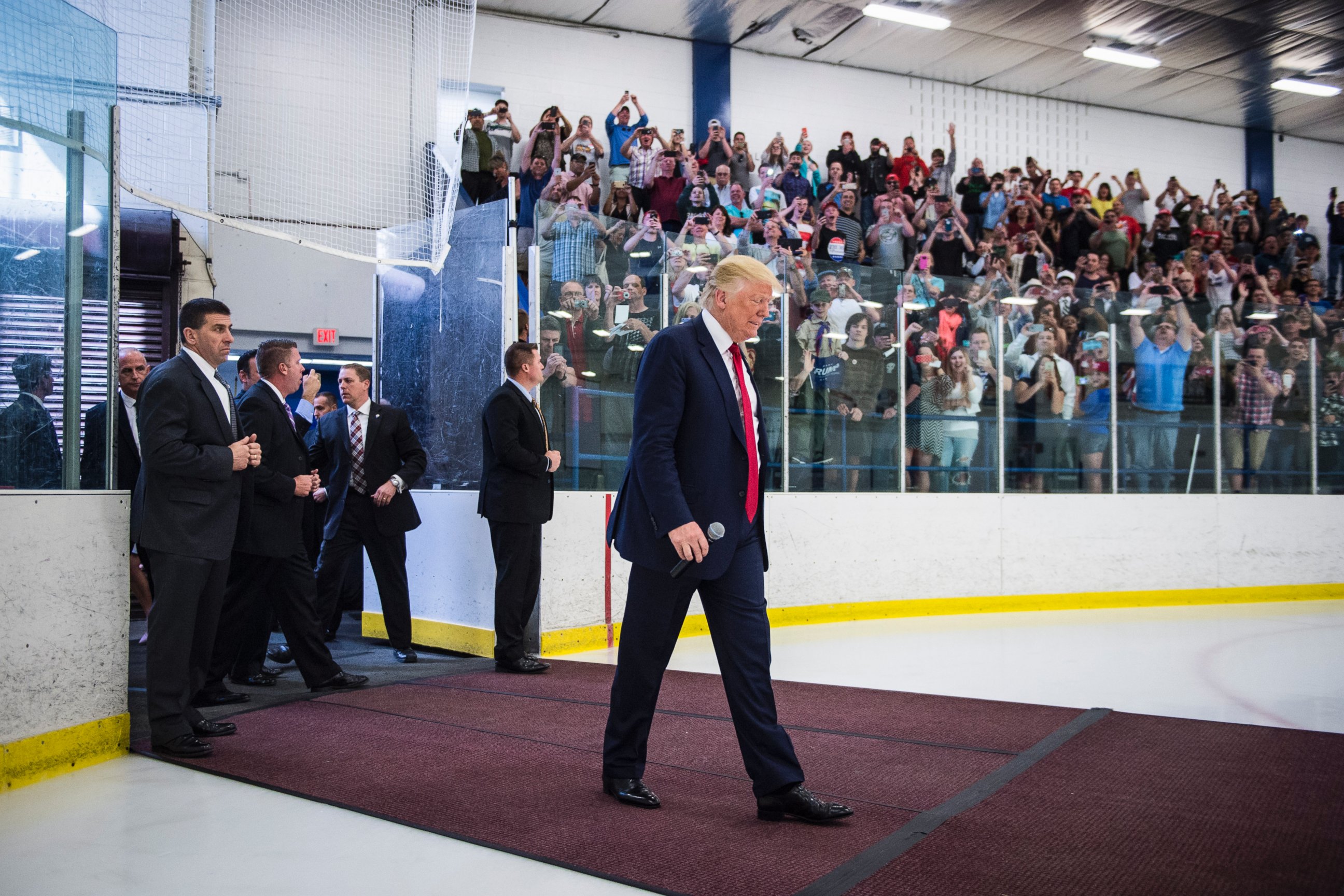 PHOTO: Presidential candidates Donald Trump walks out onto an ice rink to say a few words where an overflow crowd of supporters gathered to watch him speak during a campaign event at the Mid-Hudson Civic Center in Poughkeepsie, N.Y., April 17, 2016.